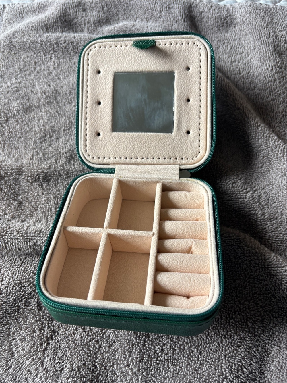 Compact Green Travel Jewelry Organizer Case about 4 x 4 inches